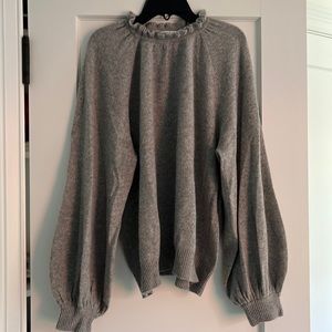 Beautiful gray sweater  frame with ruffles